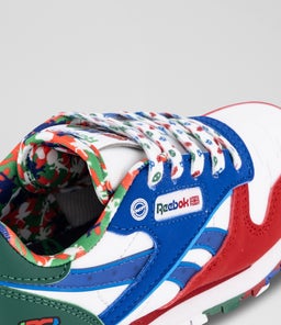 CL STEP N FLASH JNR RZ WHITE BLUE RED LEATHER